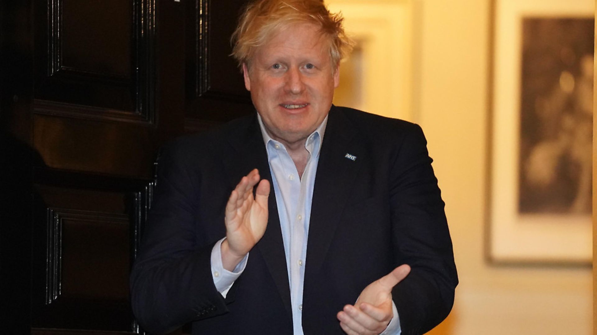 Prime Minister Boris Johnson clapping outside 11 Downing Street in London to salute local heroes during Thursday's nationwide Clap for Carers NHS initiative to applaud NHS workers fighting the coronavirus pandemic. Photograph: Pippa Fowles/Crown Copyright/10 Downing Street/PA Wire

. - Credit: PA