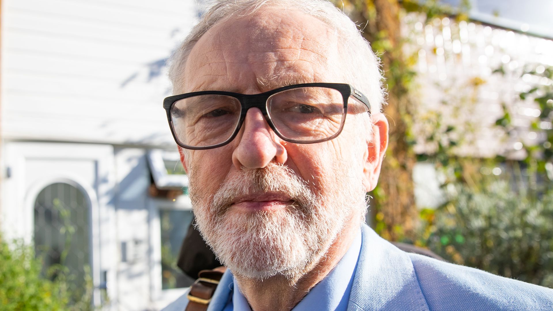 Former Labour leader Jeremy Corbyn (pictured above) has called on Boris Johnson to sack his health minister following his run-in with the law - Credit: PA