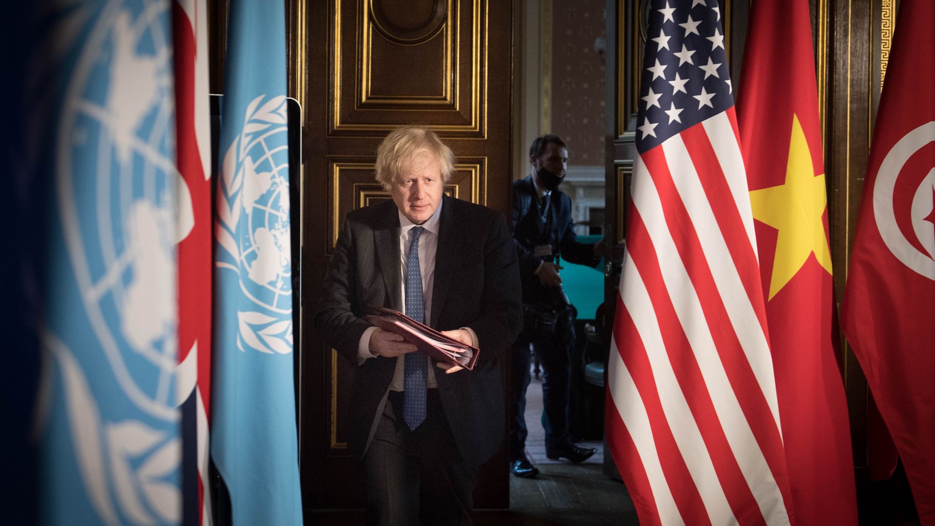 Prime minister Boris Johnson chairs a session of the UN Security Council on climate and security at the Foreign, Commonwealth and Development Office in London - Credit: PA