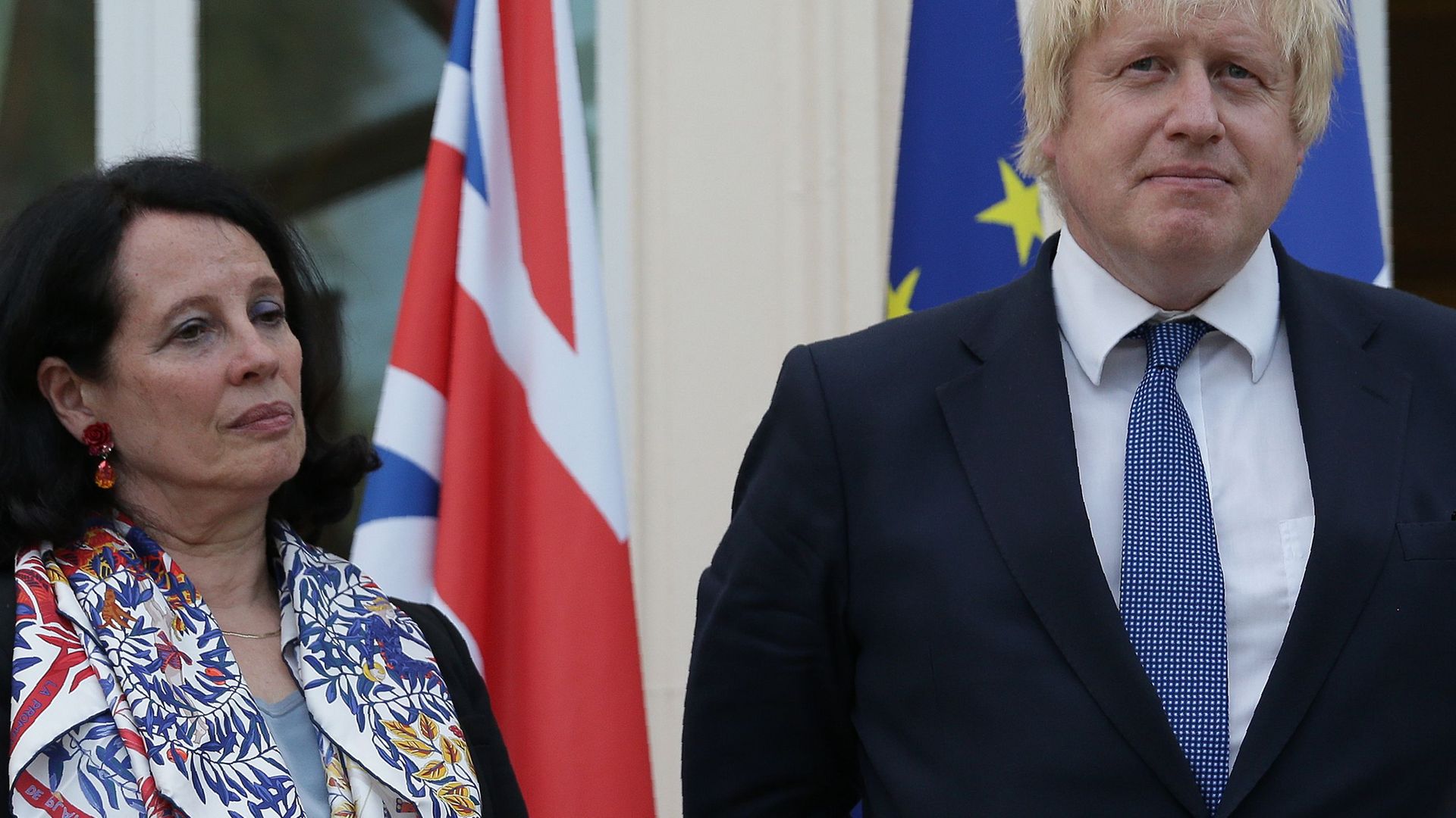 French ambassador Sylvie Bermann listens to Boris Johnson, then foreign secretary, speak during a reception in July 2016 - Credit: AFP via Getty Images