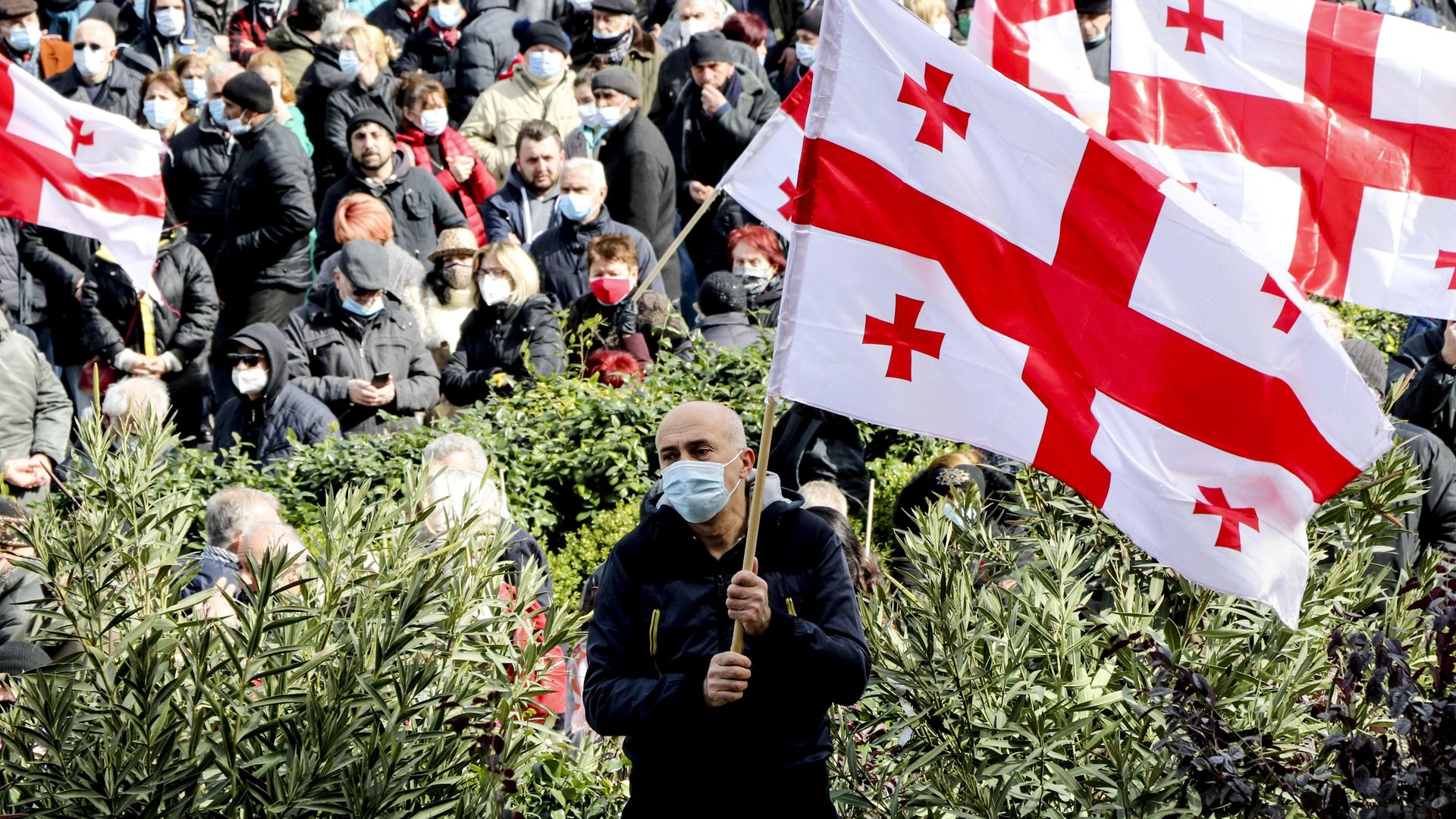 Supporters of United National Movement and the leaders of other opposition parties march to protest against detention of Nika Melia, the head of the main opposition United National Movement, in Tbilisi, Georgia - Credit: Anadolu Agency via Getty Images