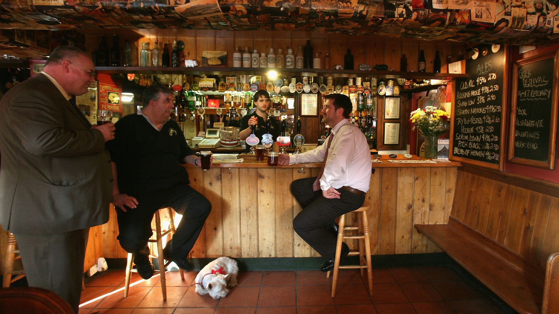 Long before lockdown was on the horizon, locals have a beer in The Old Spot Inn, in Dursley, a previous winner of CAMRA's Pub of the Year award - Credit: Getty Images