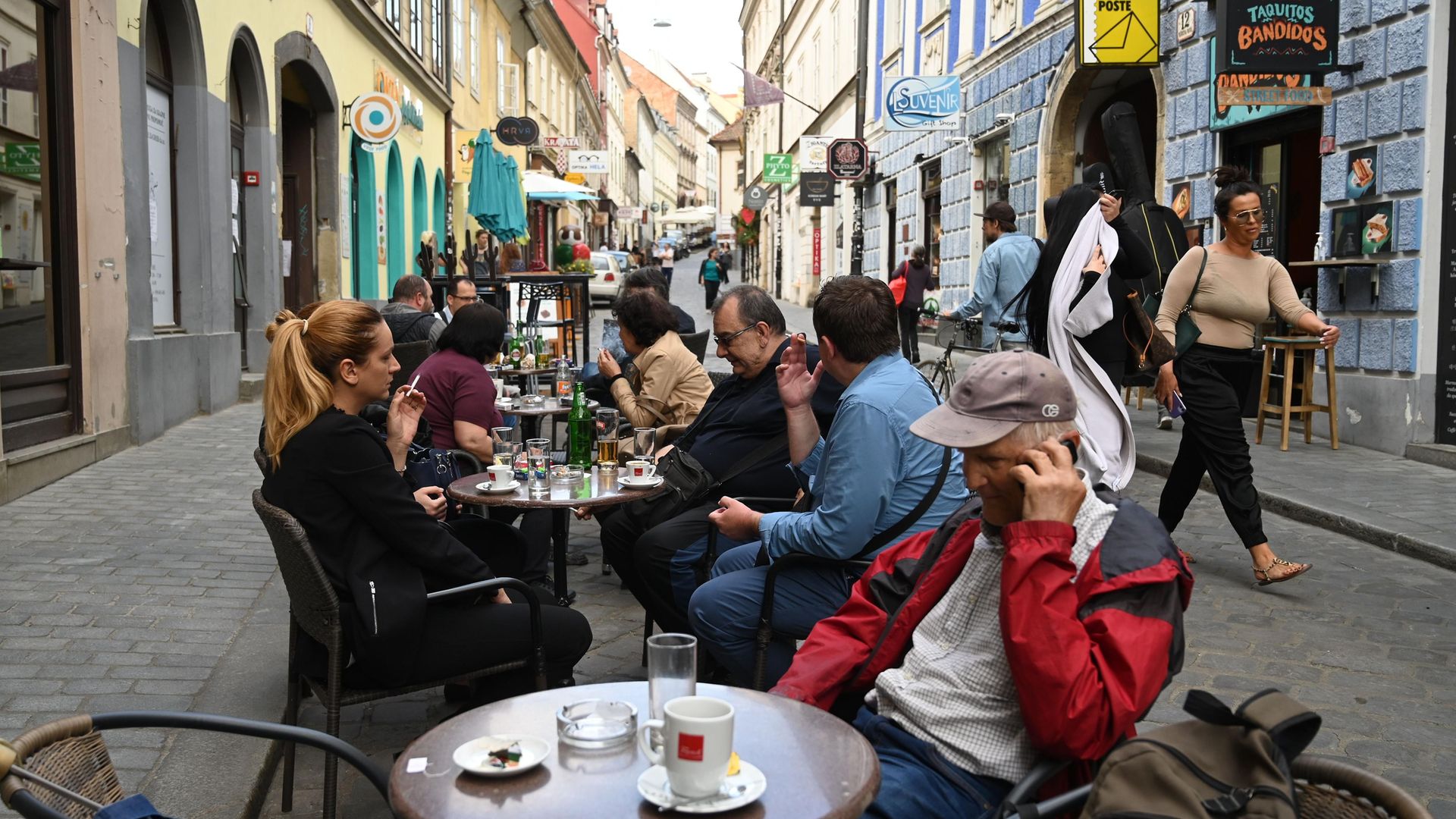 CAFE CULTURE: Customers on the terrace of a cafe in Zagreb, in May 2020. Such establishments offer a popular venue for political discussion and debate across central and southern Europe - Credit: AFP via Getty Images