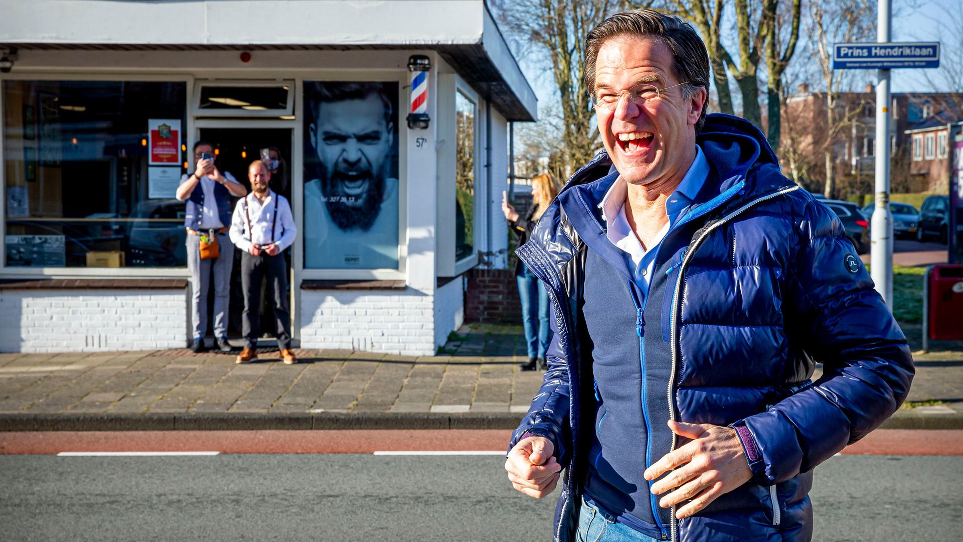 A buoyant Mark Rutte visits his hairdresser in Leidschendam after lockdown, during campaigning for the elections - Credit: Getty Images