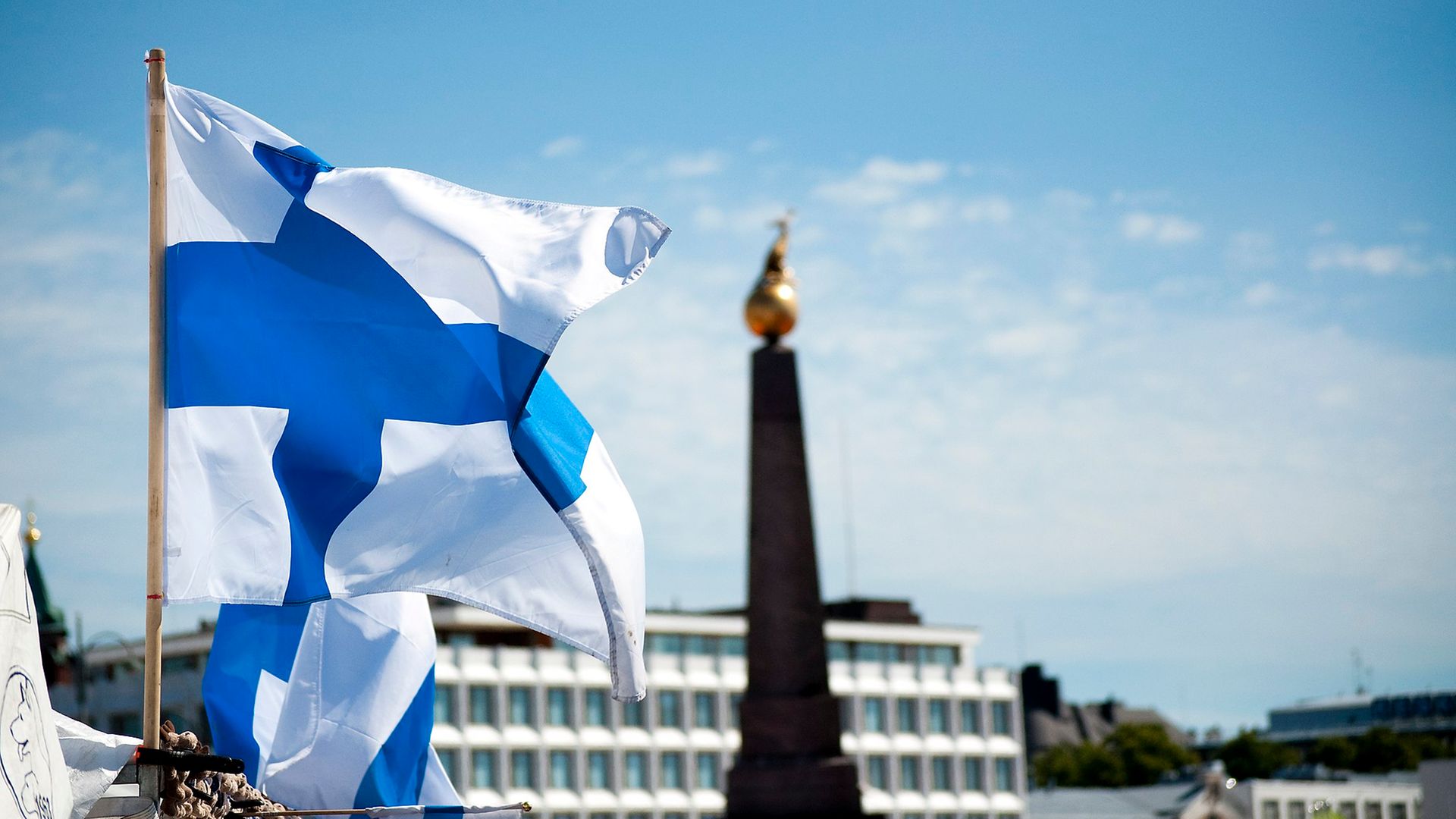 The flag of Finland flies in Helsinki - Credit: CGP Grey/Wikipedia
