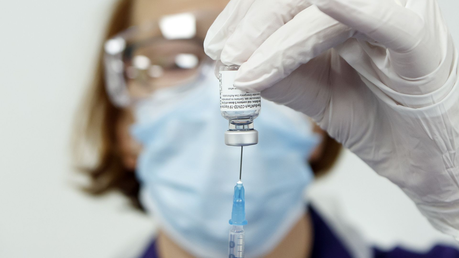 Nurse Pat Sugden prepares a vaccine at the Thackray Museum of Medicine in Leeds - Credit: PA