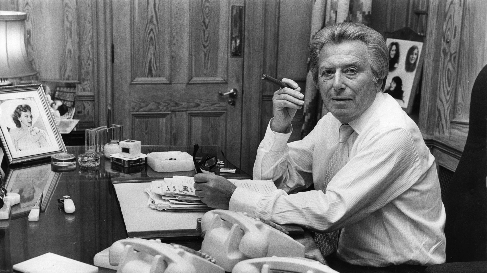 Lord Delfont, Baron Bernard Delfont of Stepney, in his EMI office in Golden Square, London - Credit: Getty Images