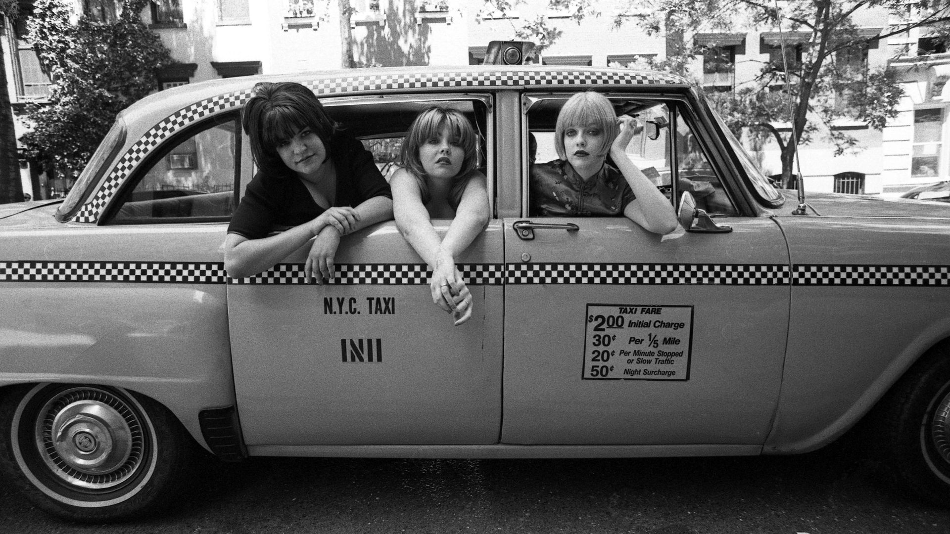 Kenickie in a New York taxi in 1997. From left: Emmy-Kate Montrose, Marie Du Santiago and Lauren Laverne - Credit: Getty Images