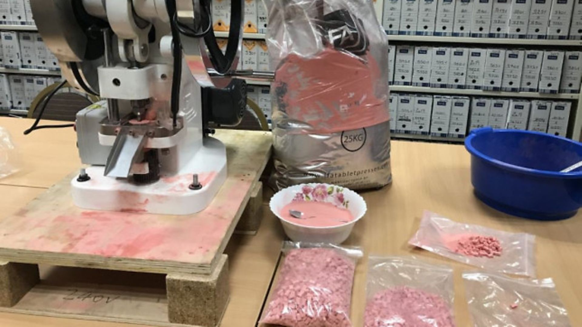 A large quantity of suspected MDMA and ecstasy, seized by police in Paris, that turned out to be Haribo strawberry sweets - Credit: Twitter/@prefpolice