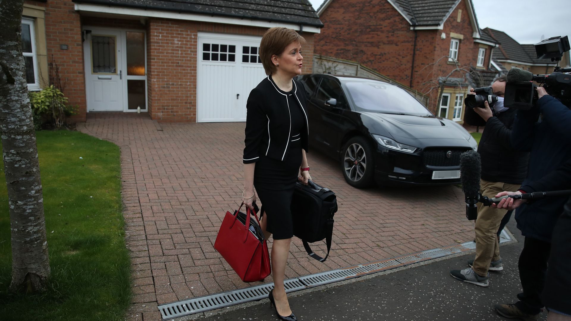First Minister of Scotland, Nicola Sturgeon, leaves her home in Glasgow - Credit: PA