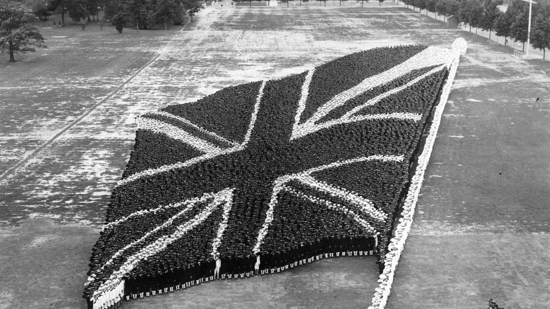 Men at the United States Naval Training Station, in Illinois, create a Union flag. circa 1917-1918. - Credit: Getty Images