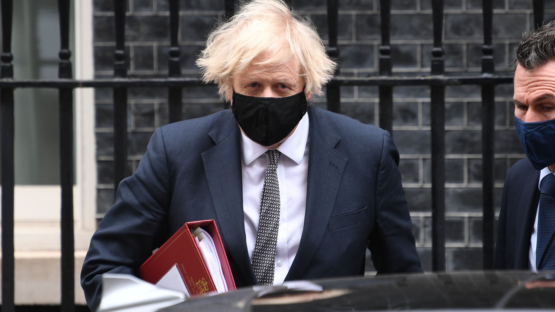 Prime minister Boris Johnson leaves 10 Downing Street to attend Prime Minister's Questions at the Houses of Parliament - Credit: PA