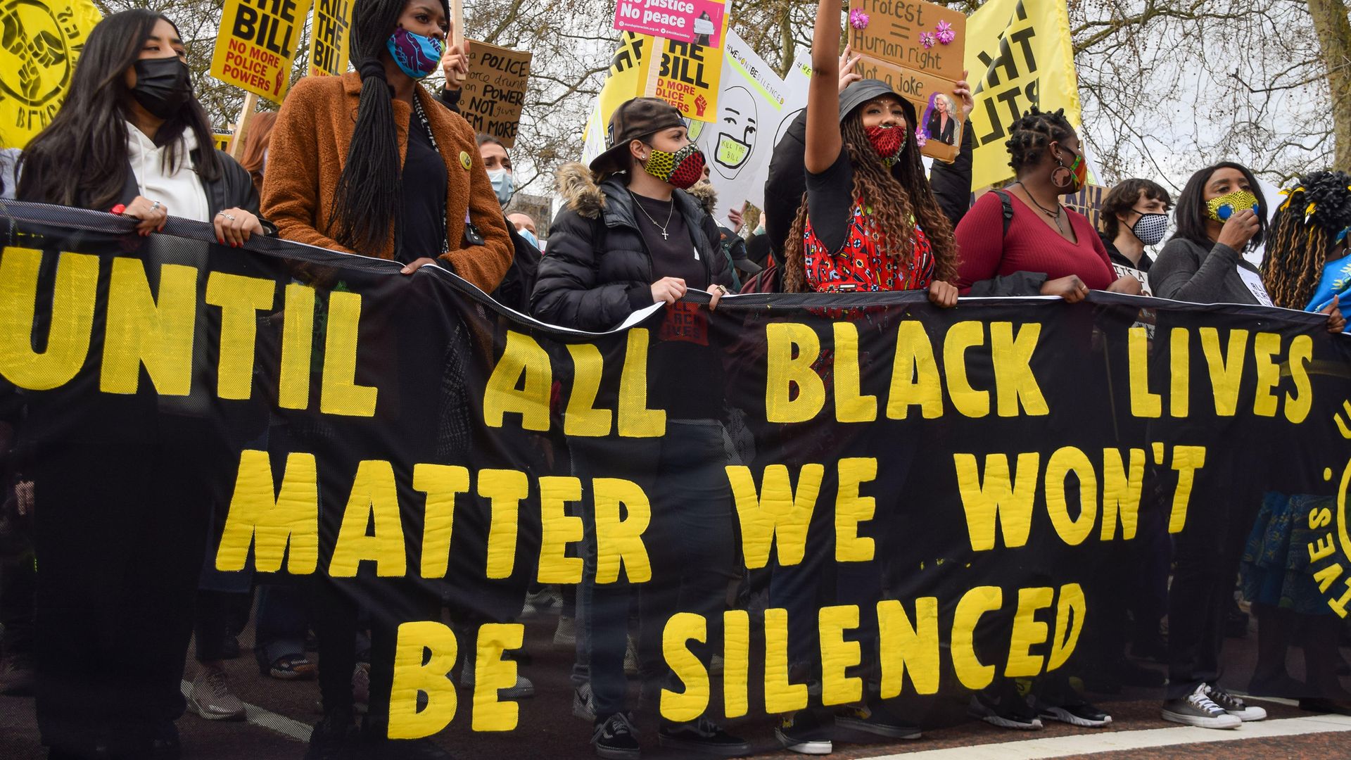 Black Lives Matter protesters hold a banner as they take part during the Kill The Bill march outside Buckingham Palace, April 3, 2021 - Credit: Photo by Vuk Valcic/SOPA Images/LightRocket via Getty Images