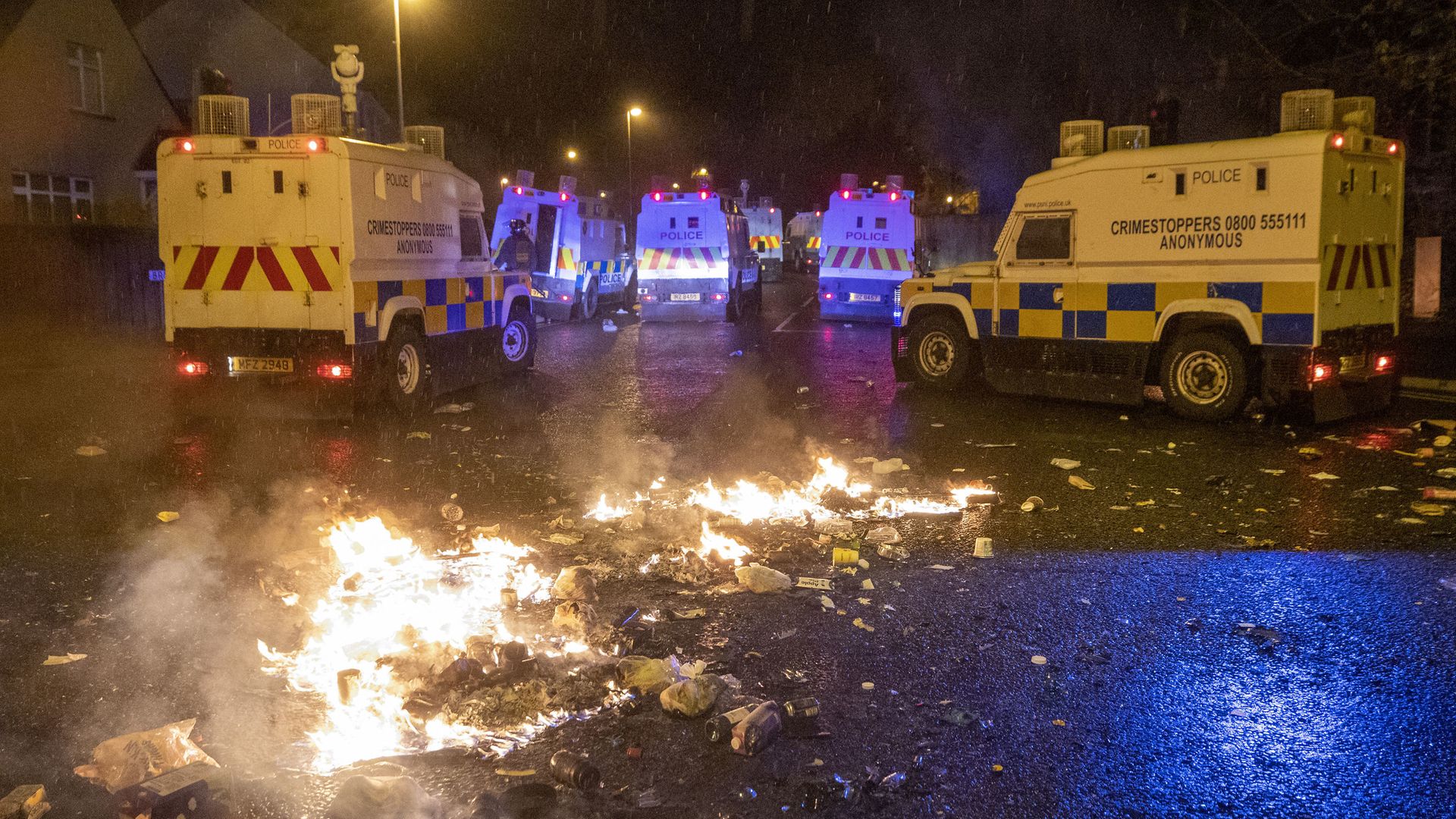 PSNI Tactical Support Group (TSG) officers in attendance at the Loyalist Nelson Drive Estate in the Waterside of Derry City, Co. Londonderry - Credit: PA