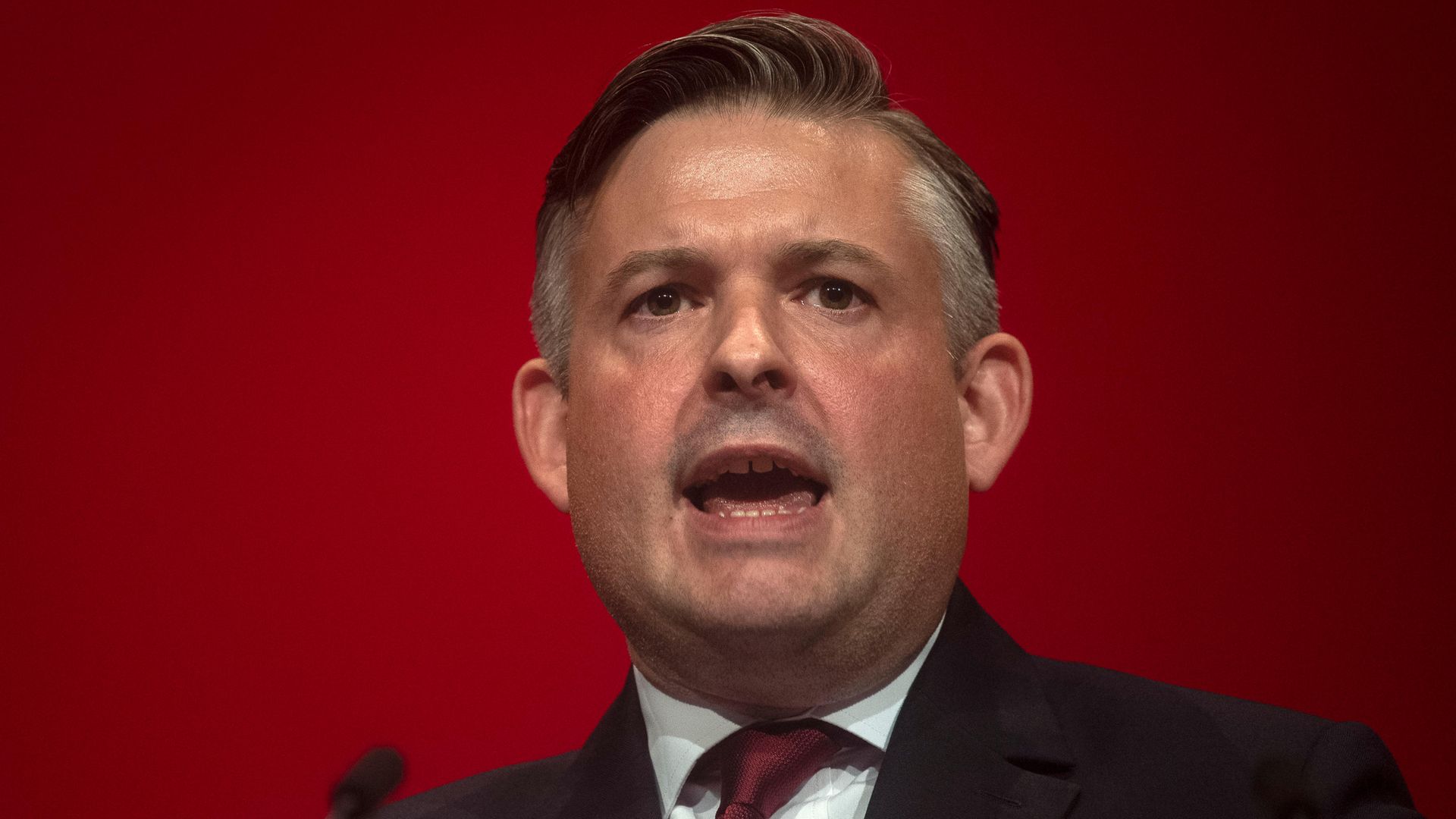 Jon Ashworth, Shadow secretary of state for health, delivers his speech at the Labour Party Conference. - Credit: PA