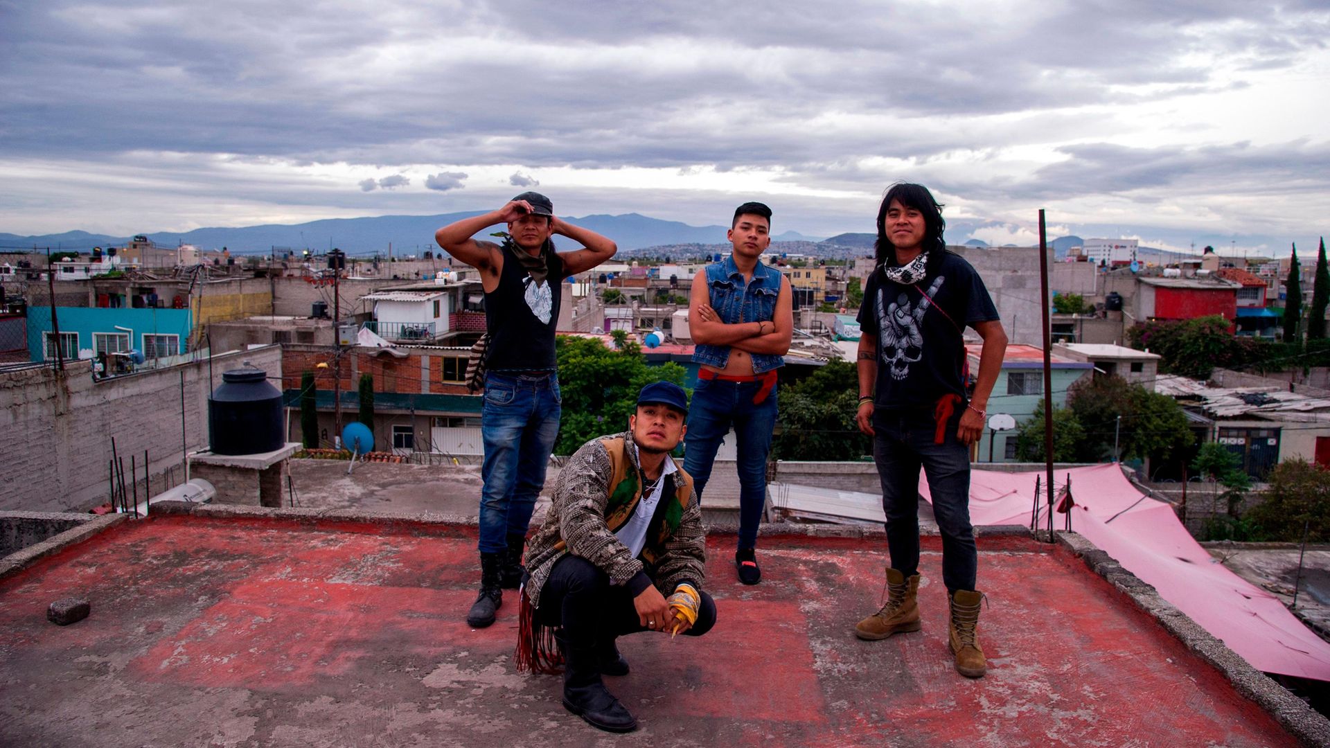 Members of Los Cogelones, the Sandoval Garcia brothers (L-R) Beto, Victor, Gabriel and Marco, in Nezahualcoyotl, which neighbours Mexico City and is home to the world’s largest shanty town - Credit: AFP via Getty Images