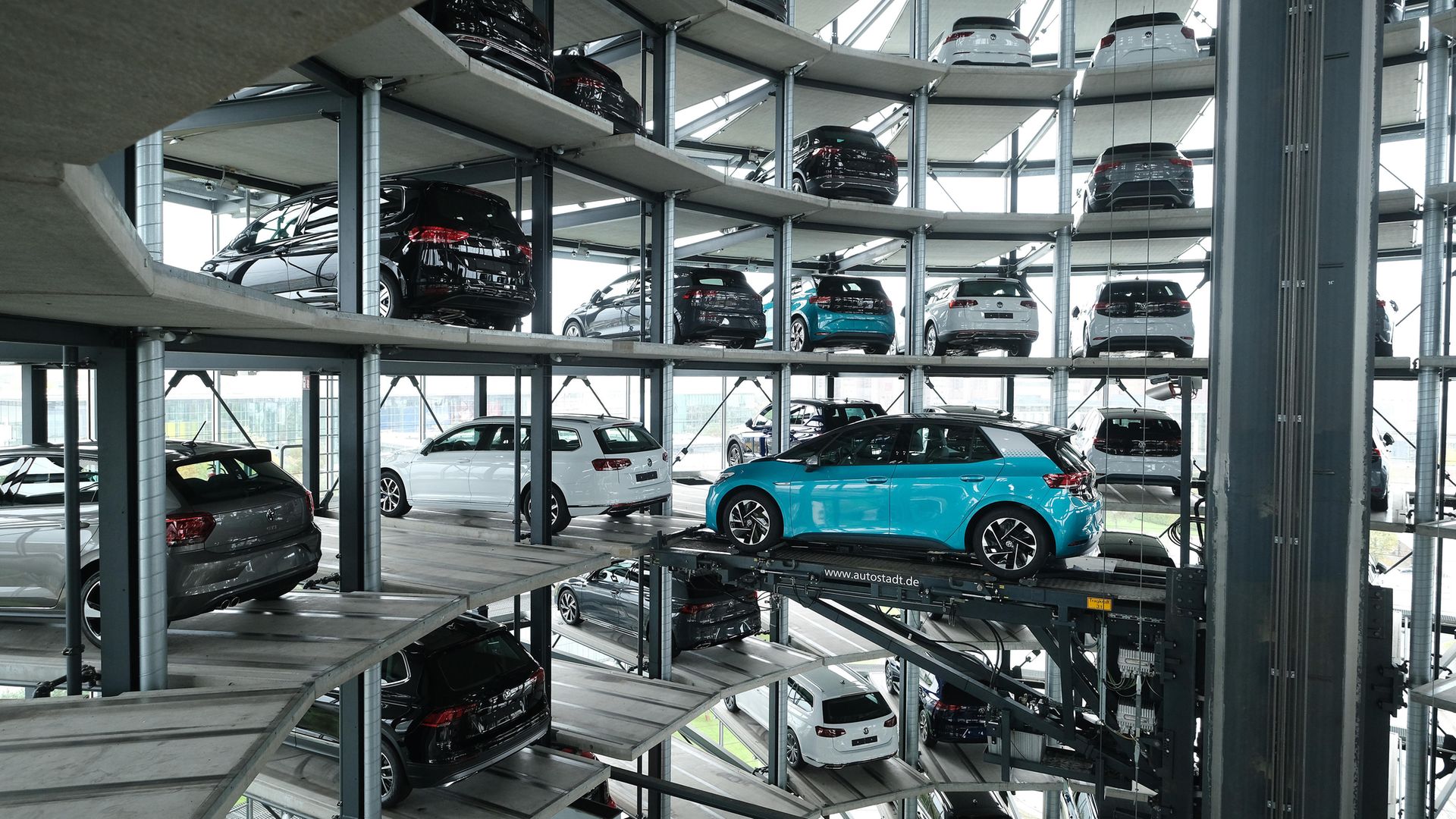 A Volkswagen ID.3 electric car stands on an elevator platform inside one of the twin towers used as storage at the Autostadt promotional facility next to the Volkswagen factory in Wolfsburg, Germany. The ID.3 and somewhat bigger ID.4 are Volkswagen's first real effort to break into the growing electric car market and are aimed for mass appeal - Credit: Getty Images