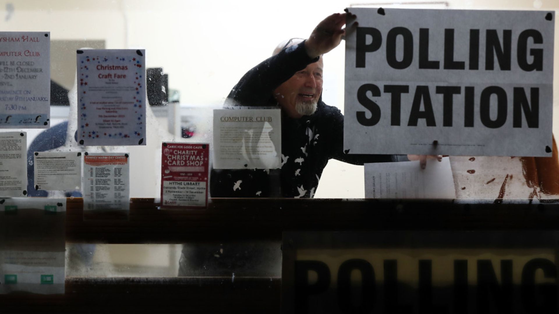 A polling station is set-up as voters go to the polls - Credit: PA