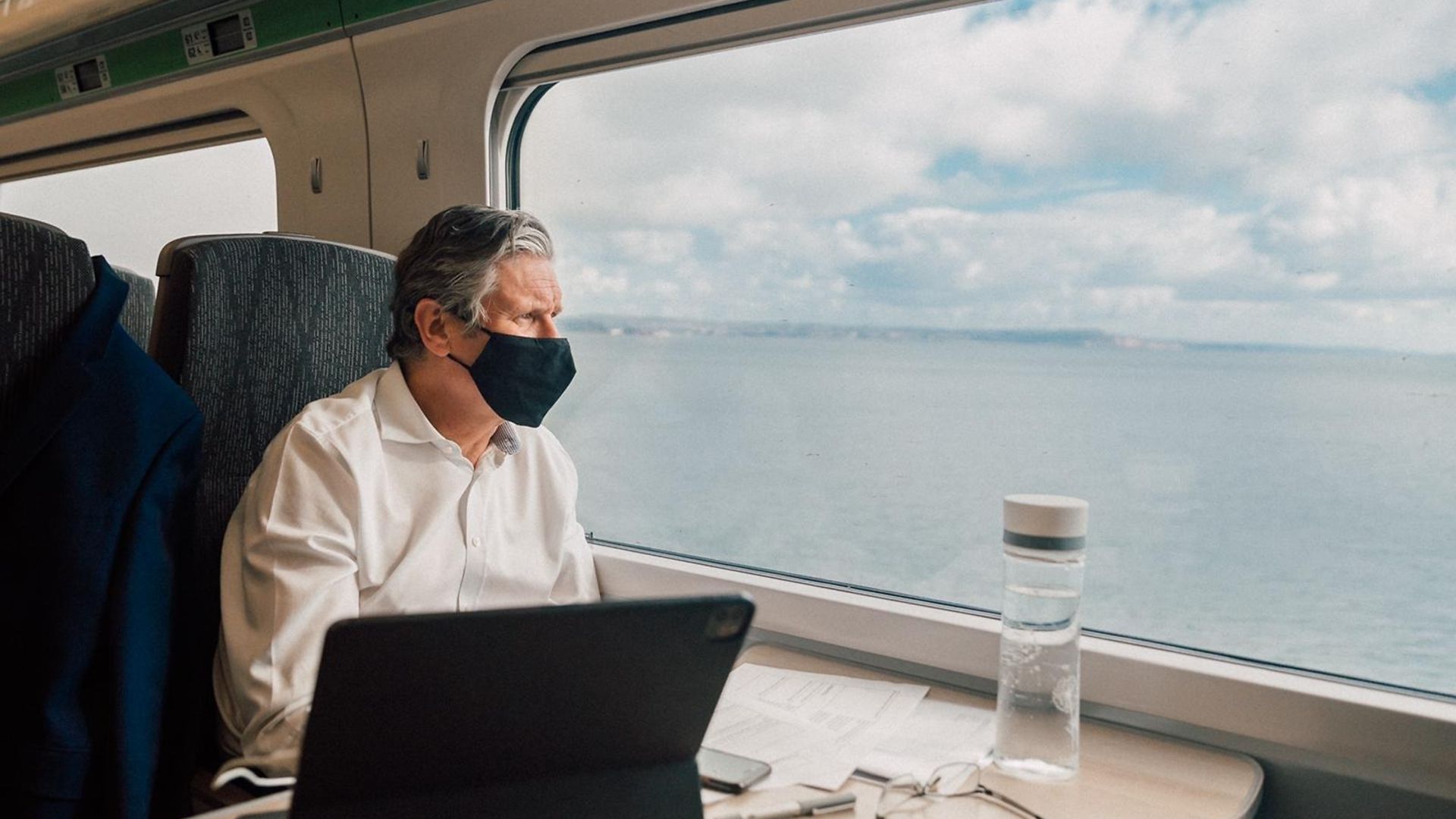 Labour leader Keir Starmer takes the train whilst campaigning - Credit: Labour Party