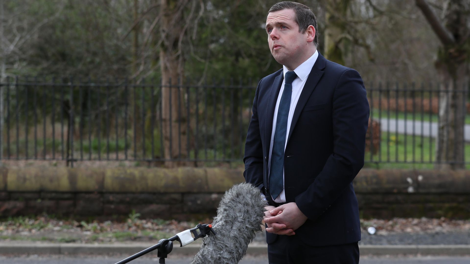 Scottish Conservative Leader Douglas Ross said Boris Johnson's absence from campaigning in Scotland is due to Covid restrictions - Credit: PA