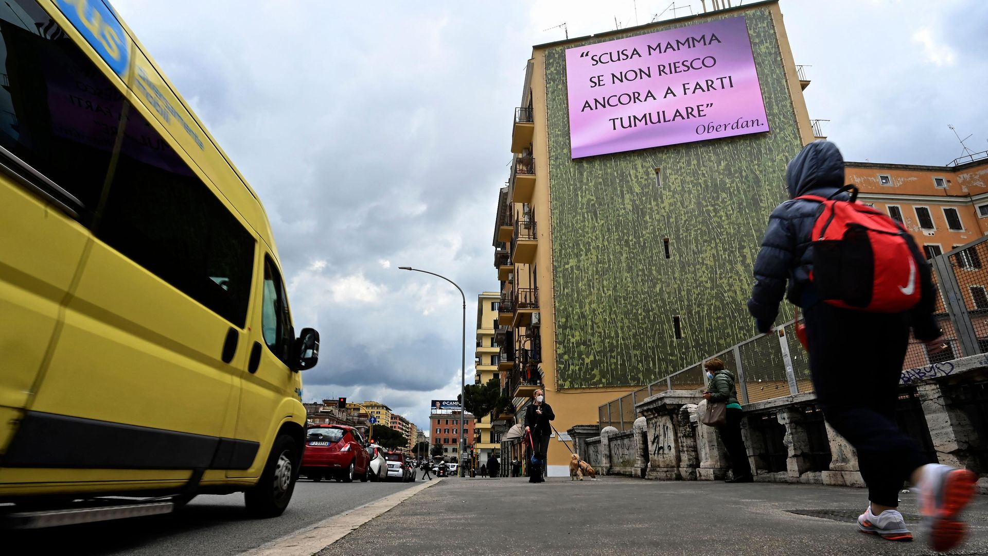 The Rome advertising boards put up by Oberdan Zuccaroli in protest at not being able to bury his mother. The message reads "Mum, I'm sorry I've not been able to have you buried yet" - Credit: Photo by Alberto Pizzoli/AFP via Getty Images