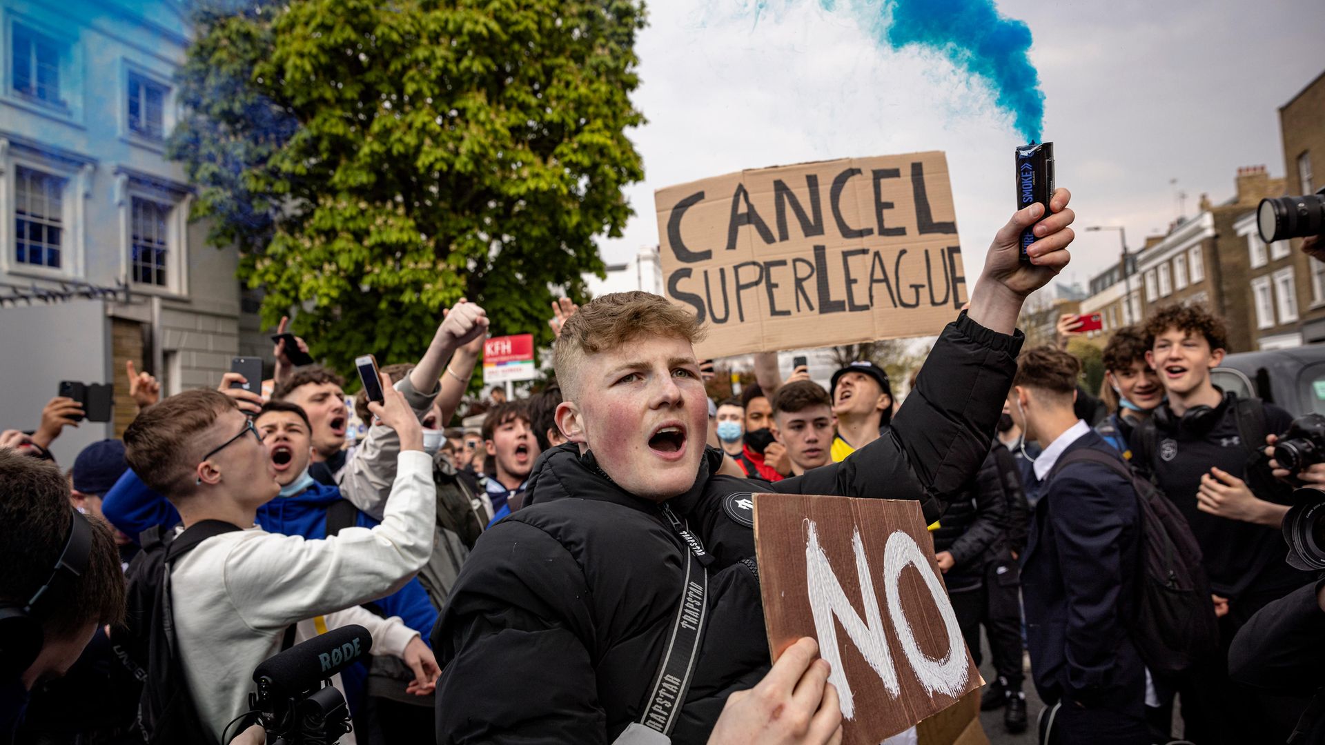 Fans of Chelsea Football Club protest against the European Super League outside Stamford Bridge - Credit: Getty Images