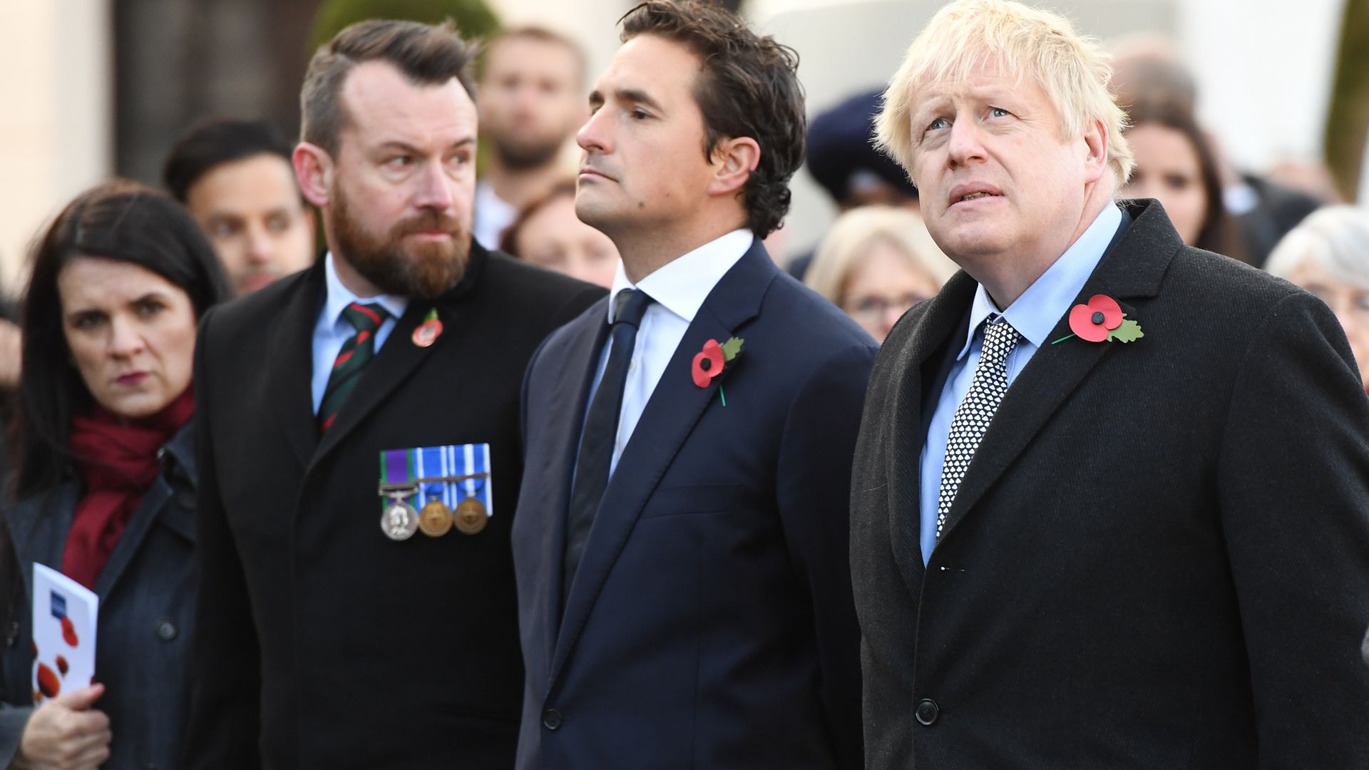 Prime minister Boris Johnson (right) and former defence minister Johnny Mercer (centre) during a service at the cenotaph in St Peter's Square, Wolverhampton, to mark Armistice Day in 2019 - Credit: PA