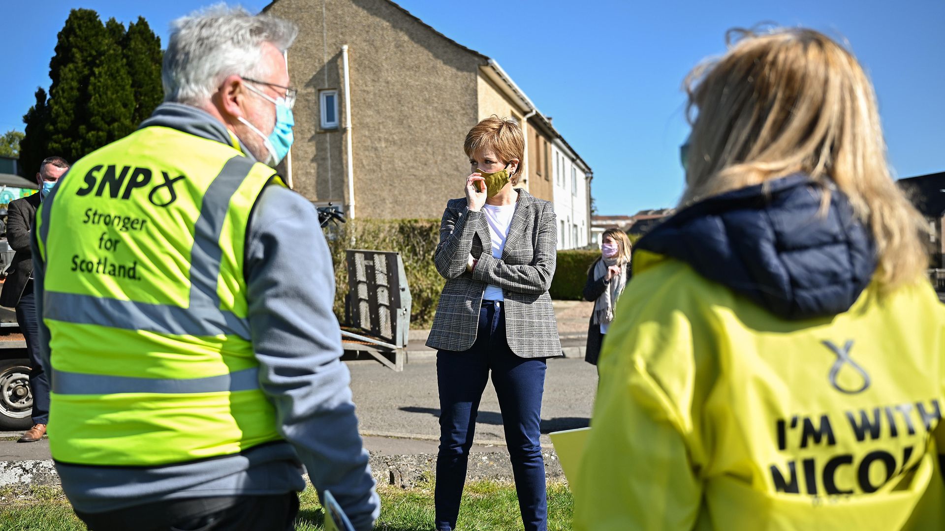 First minister Nicola Sturgeon speaks to Scottish National Party (SNP) volunteers in Dumbarton, West Dunbartonshire, during campaigning for the Scottish Parliamentary election - Credit: PA