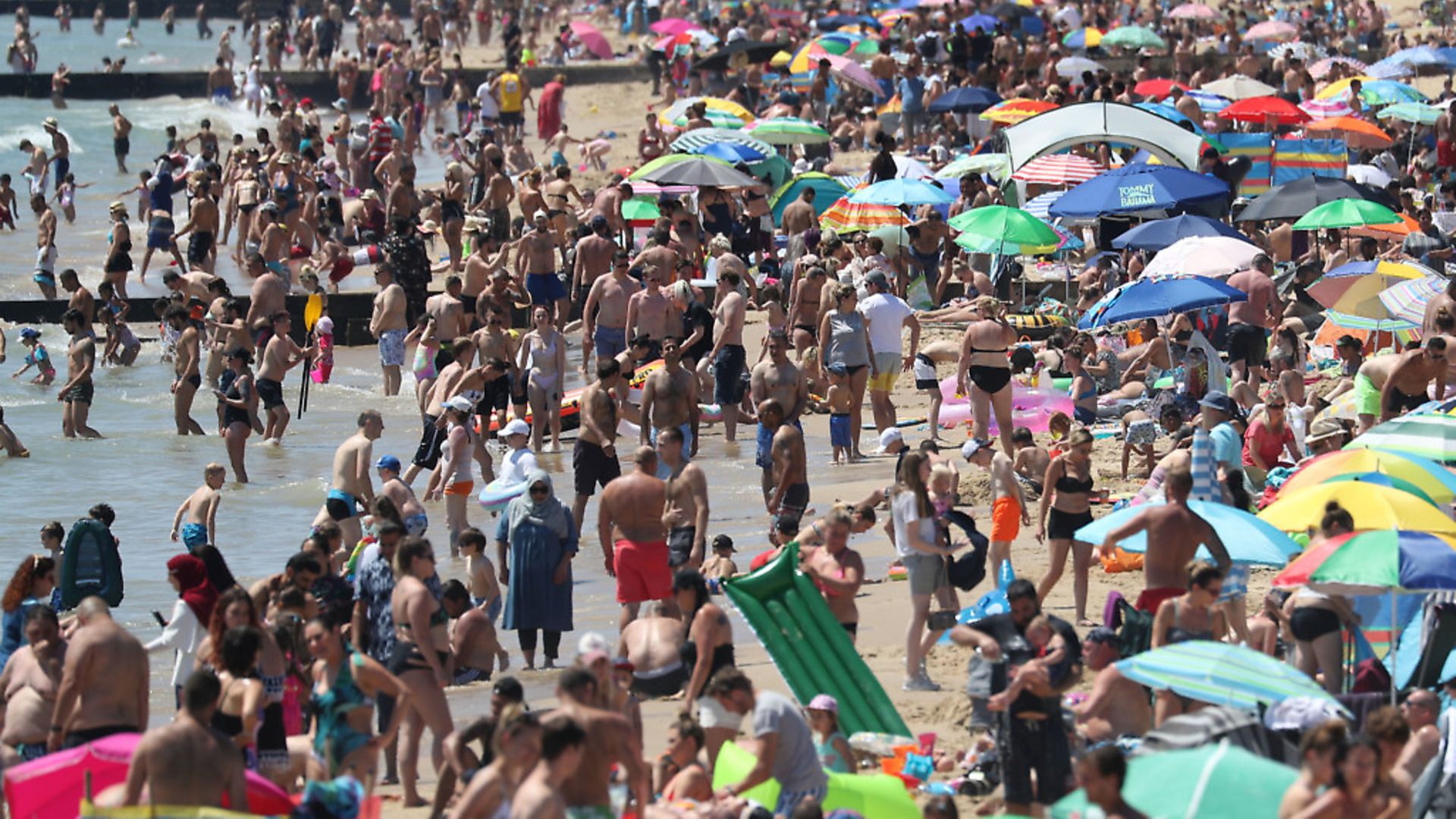 Crowds gather on the beach in Bournemouth on one of the hottest days of the year. Photograph: Andrew Matthews/PA Wire - Credit: PA