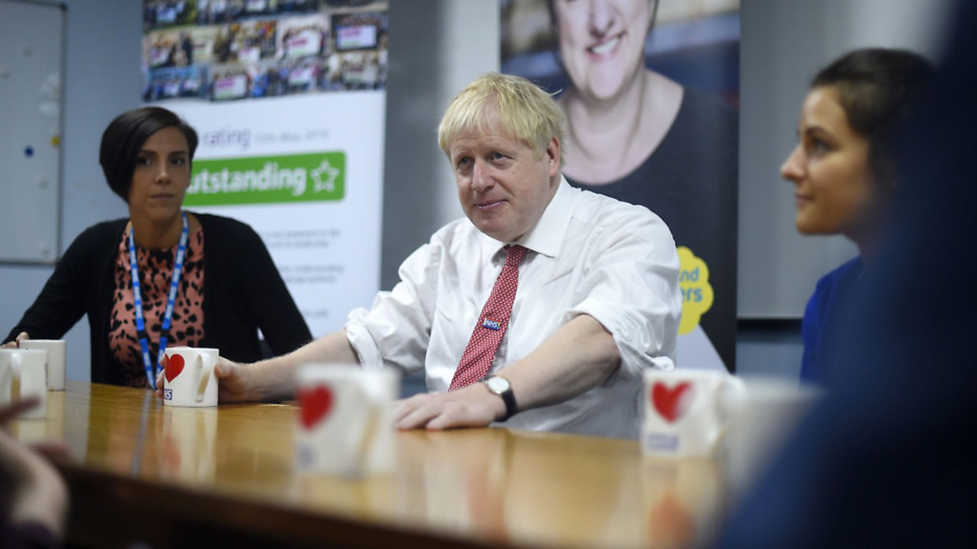 Boris Johnson speaks with health care professionals. Photograph: Peter Summers/PA. - Credit: PA