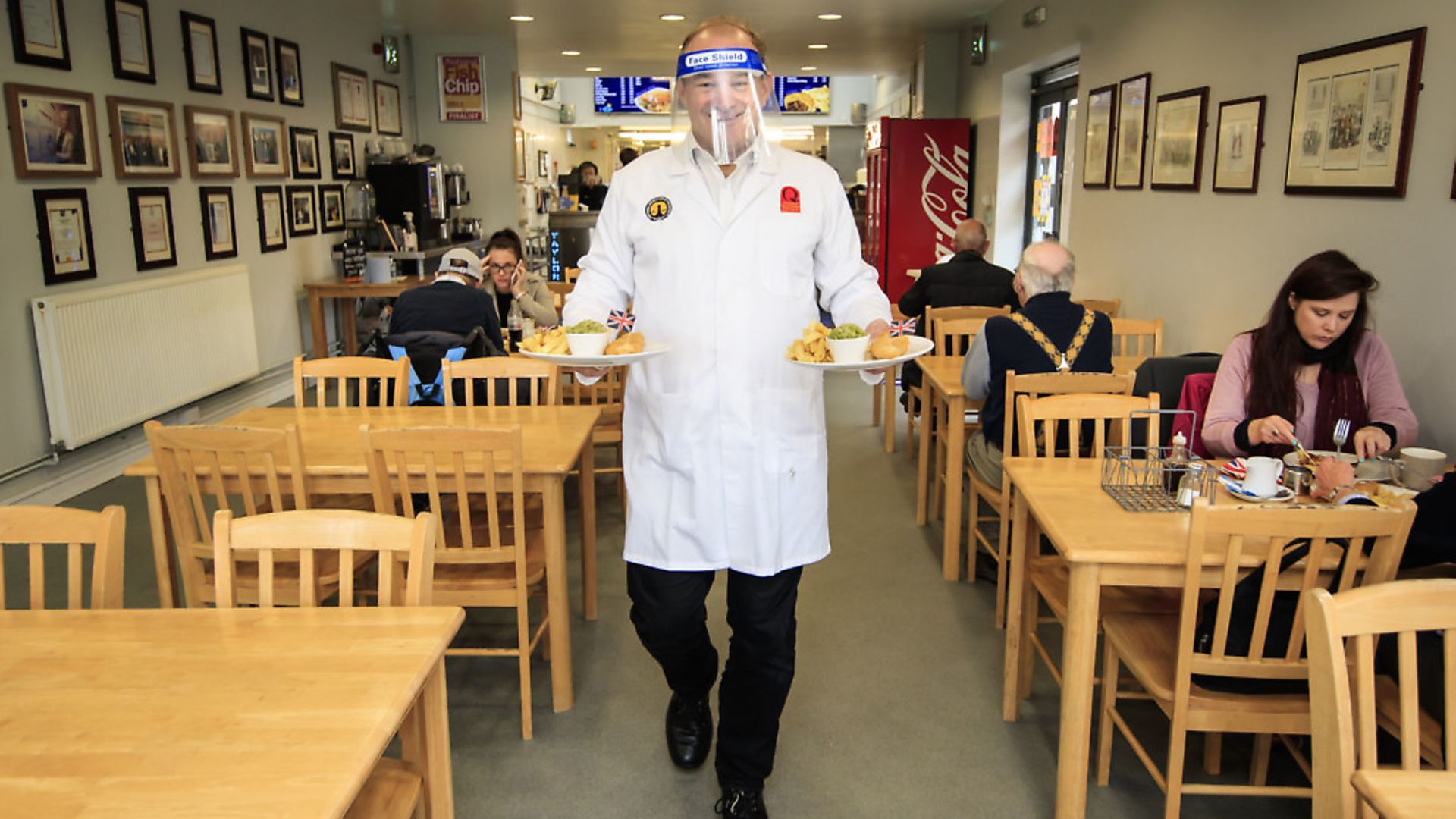 Liberal Democrat leader Ed Davey undertakes a 'shift' in Taylor's chip shop, in Stockport, during the start of his national listening tour. Photograph: Danny Lawson/PA Wire,
. - Credit: PA