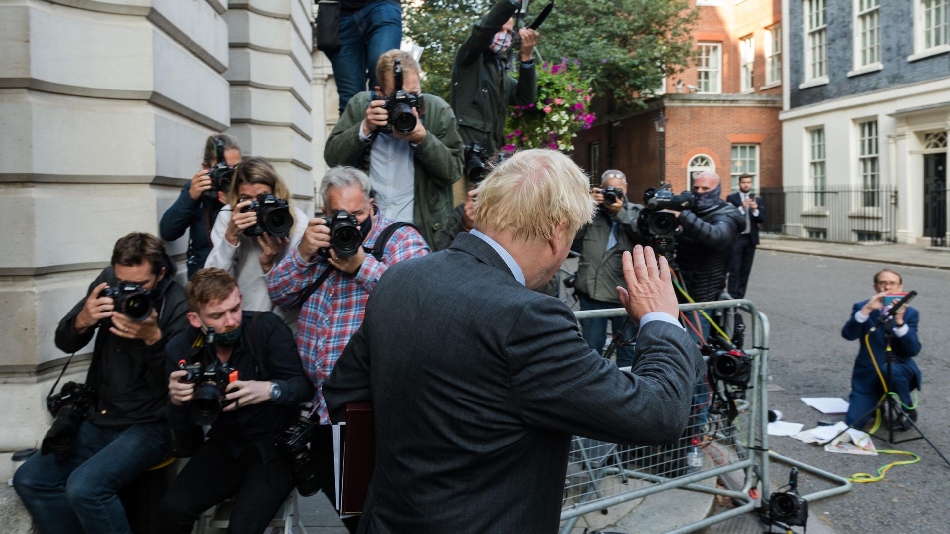 Boris Johnson in Downing Street shortly before announcing new coronavirus restrictions - Credit: NurPhoto via Getty Images