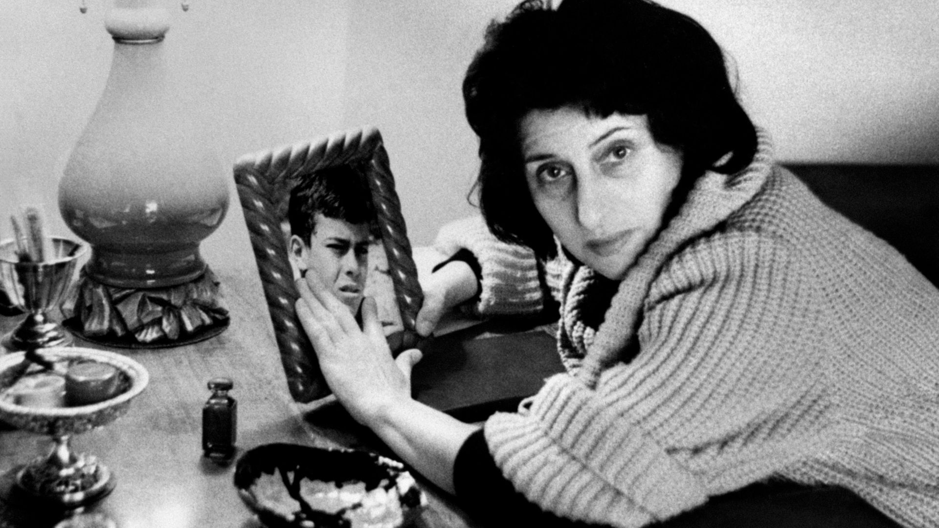 Italian actress Anna Magnani showing a photograph of her son, Luca - Credit: Mondadori via Getty Images