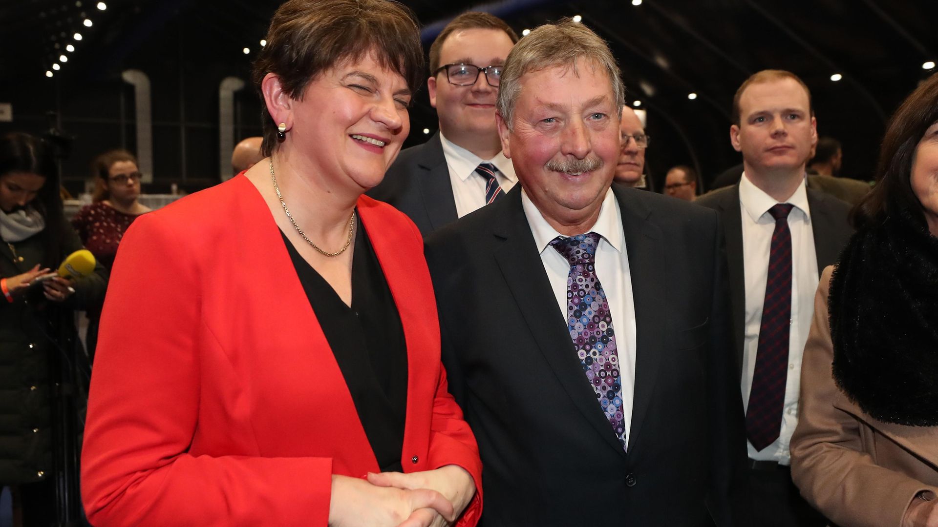 The DUP's Sammy Wilson celebrates with party leader Arlene Foster after winning the South Down seat at the Titanic exhibition centre, Belfast, for the 2019 General Election; Liam McBurney/ PA Images - Credit: PA