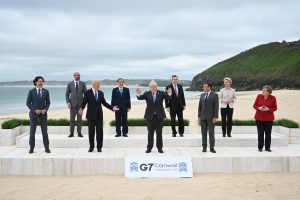 Centre of attention... Boris Johnson clowns around at this summer's G7 summit in Cornwall. From left: Canadian PM Justin Trudeau, president of the European Council Charles Michel, US president Joe Biden, Japanese PM Yoshihide Suga, Johnson, Italian PM Mario Draghi, French president Emmanuel Macron, president of the European Commission Ursula von der Leyen and German chancellor Angela Merkel.