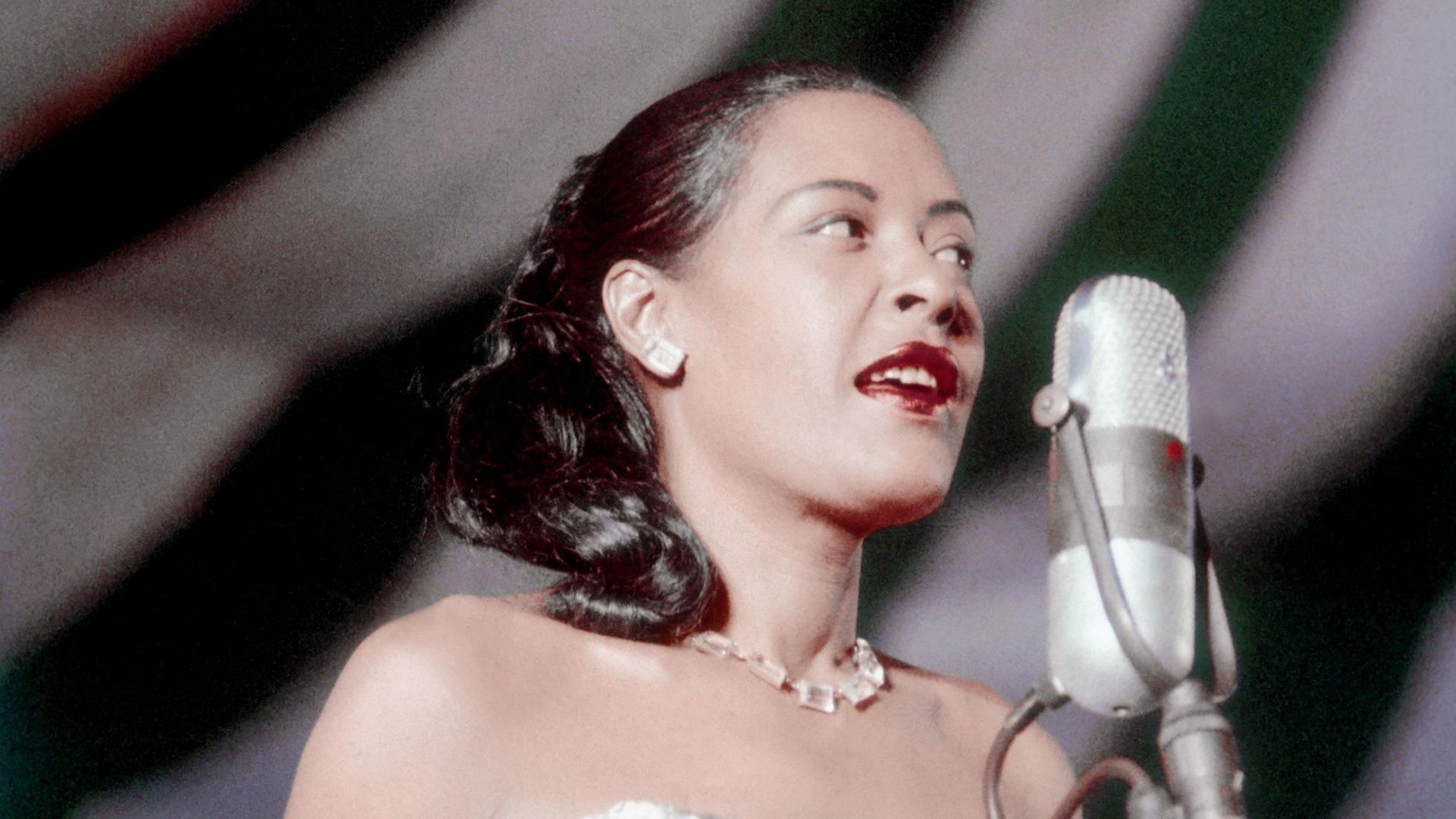 Billie Holiday performs at the Newport Jazz festival in Newport, Rhode Island - Credit: Photo by Bill Spilka/Getty Images