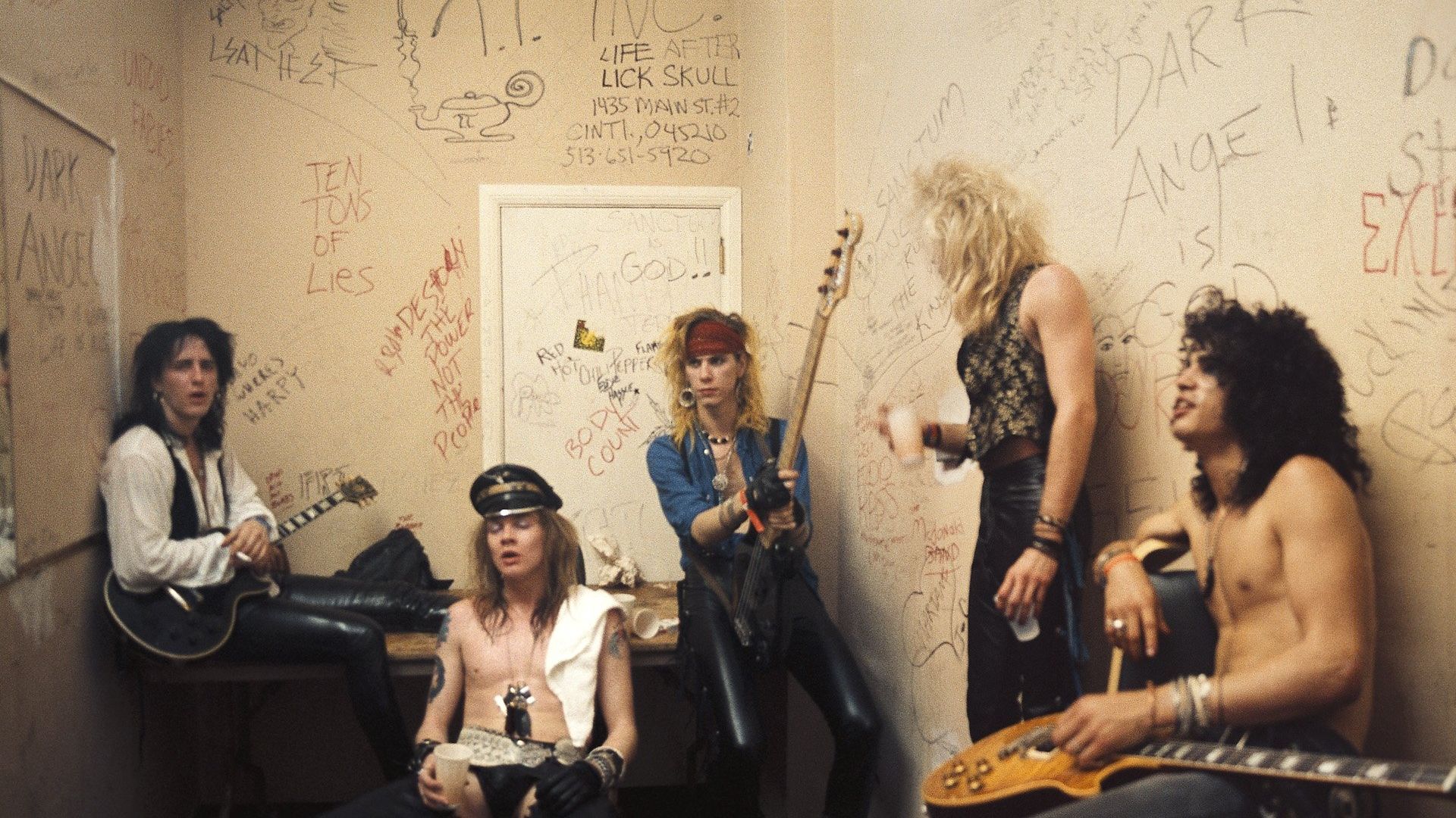 From left to right, Izzy Stradlin, Axl Rose, Duff McKagan, Steven Adler and Slash of Guns n' Roses pose for a portrait backstage at Fenders Ballroom, Long Beach, on March 31, 1986. They were opening up for Johnny Thunders that night and got signed to Geffen five days later - Credit: Getty Images