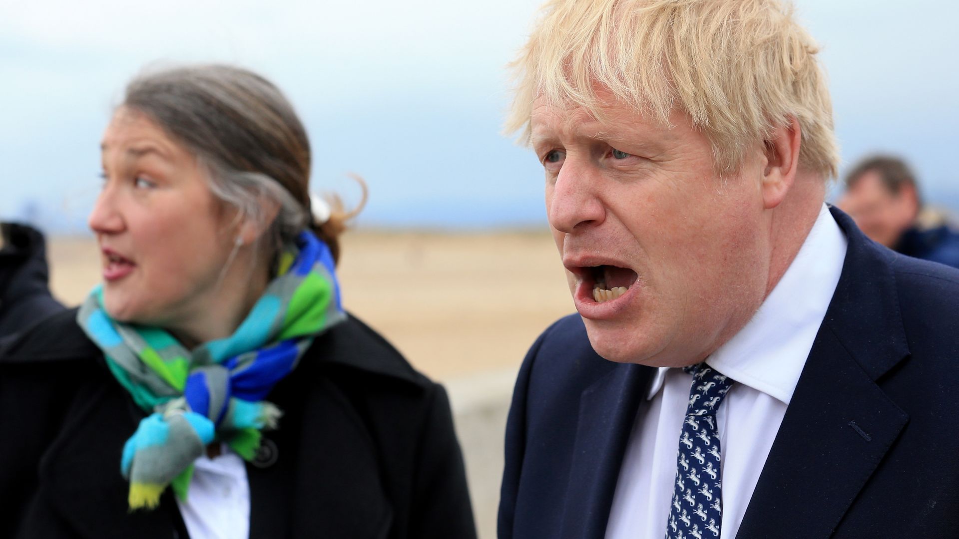 Prime minister Boris Johnson (right) reacts as he campaigns on behalf of Conservative Party candidate Jill Mortimer in Hartlepool, in the north-east of England ahead of the 2021 Hartlepool by-election to be held on May 6 - Credit: PA