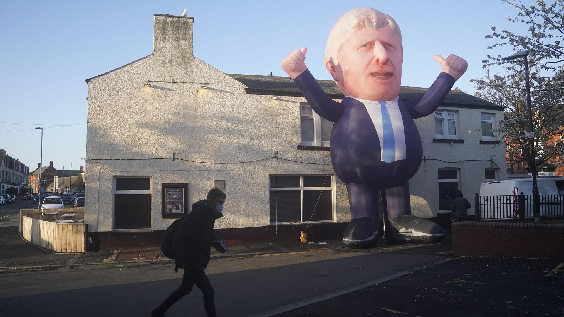 A 30ft inflatable Boris Johnson erected outside Mill House Leisure Centre in Hartlepool, where votes are being counted for the Hartlepool parliamentary by-election - Credit: PA
