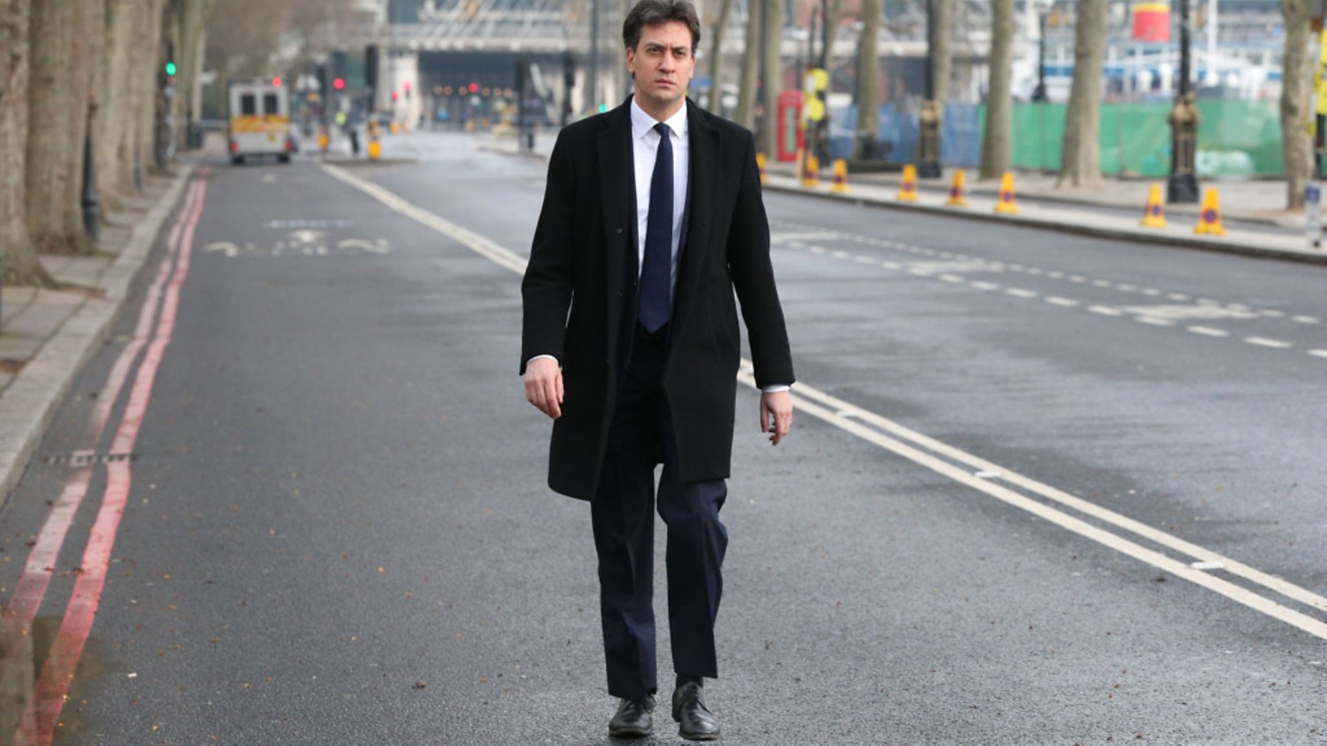 Former Labour party leader Ed Miliband walks along Victoria Embankment in London. - Credit: PA