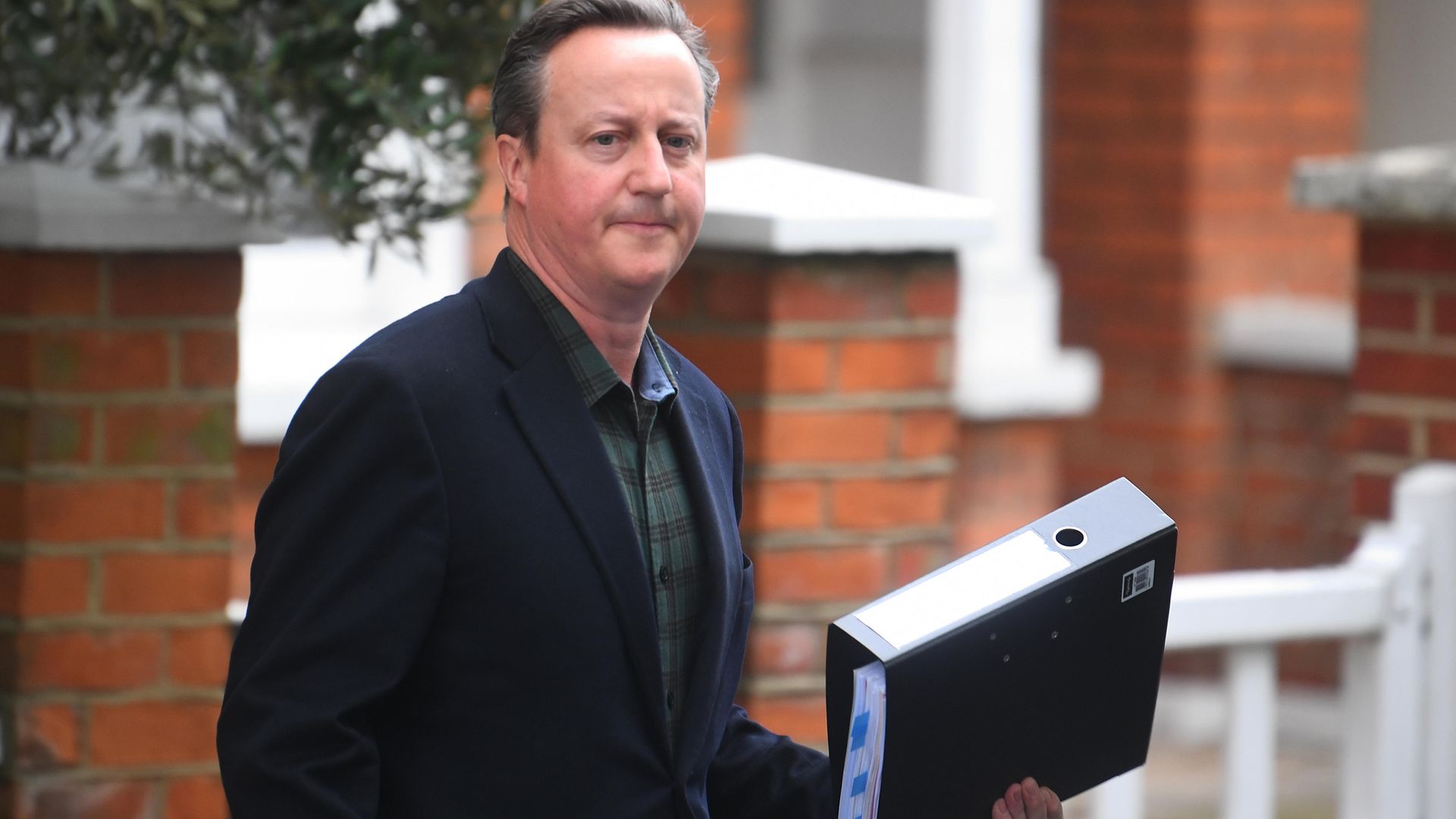 David Cameron leaves his home in London ahead of giving evidence to the Commons Treasury Committee on Greensill Capital - Credit: PA