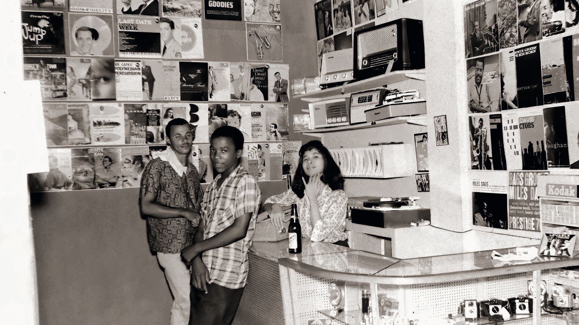 Patricia Chin behind the counter of Randy's Record Mart, in 1957 - Credit: VP