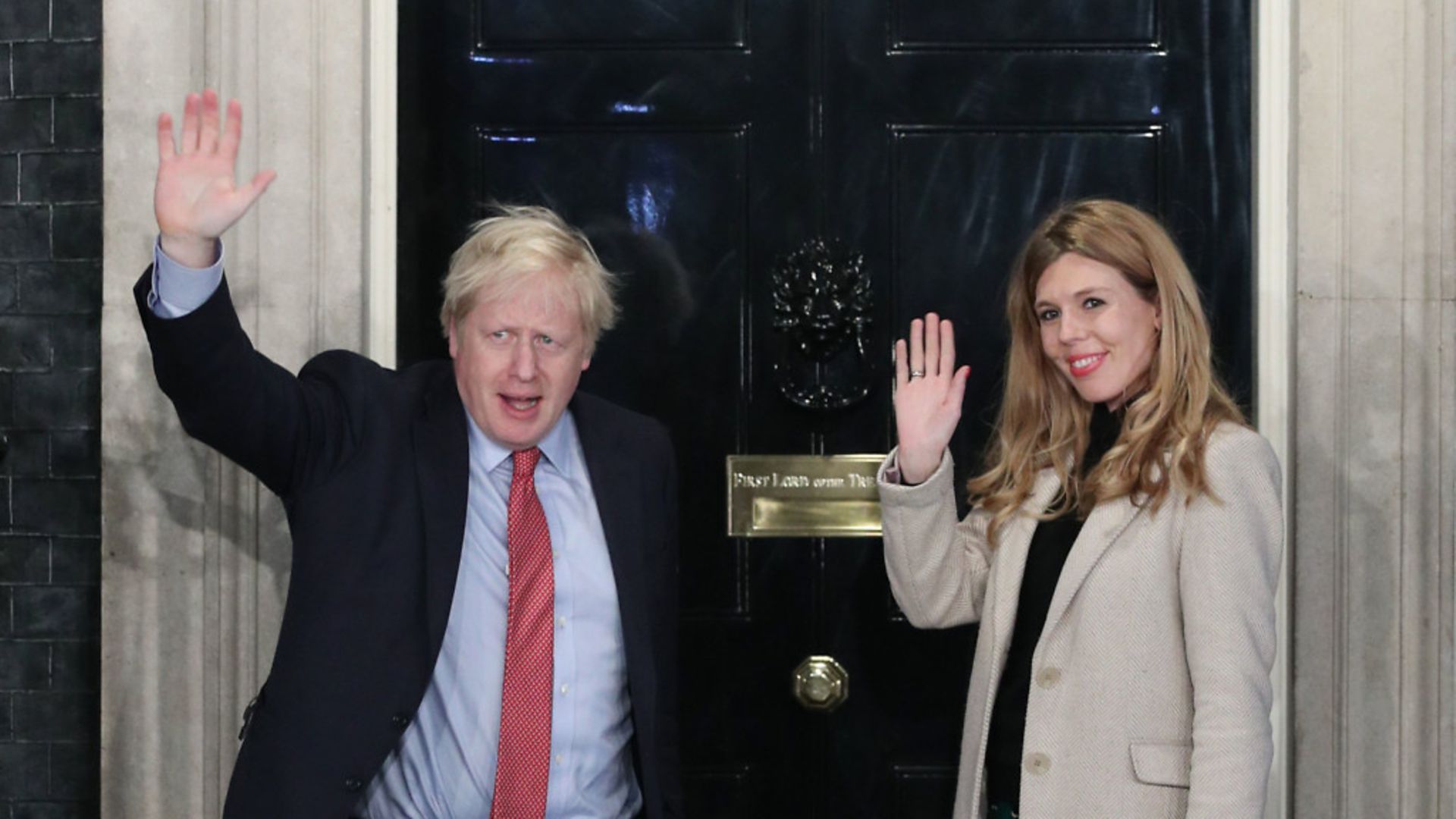 Prime minister Boris Johnson with fiancée Carrie Symonds outside No 10 - Credit: PA
