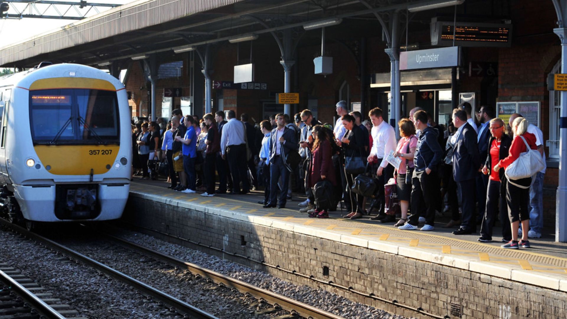 Commuters waiting for a train on the c2c line. - Credit: PA WIRE