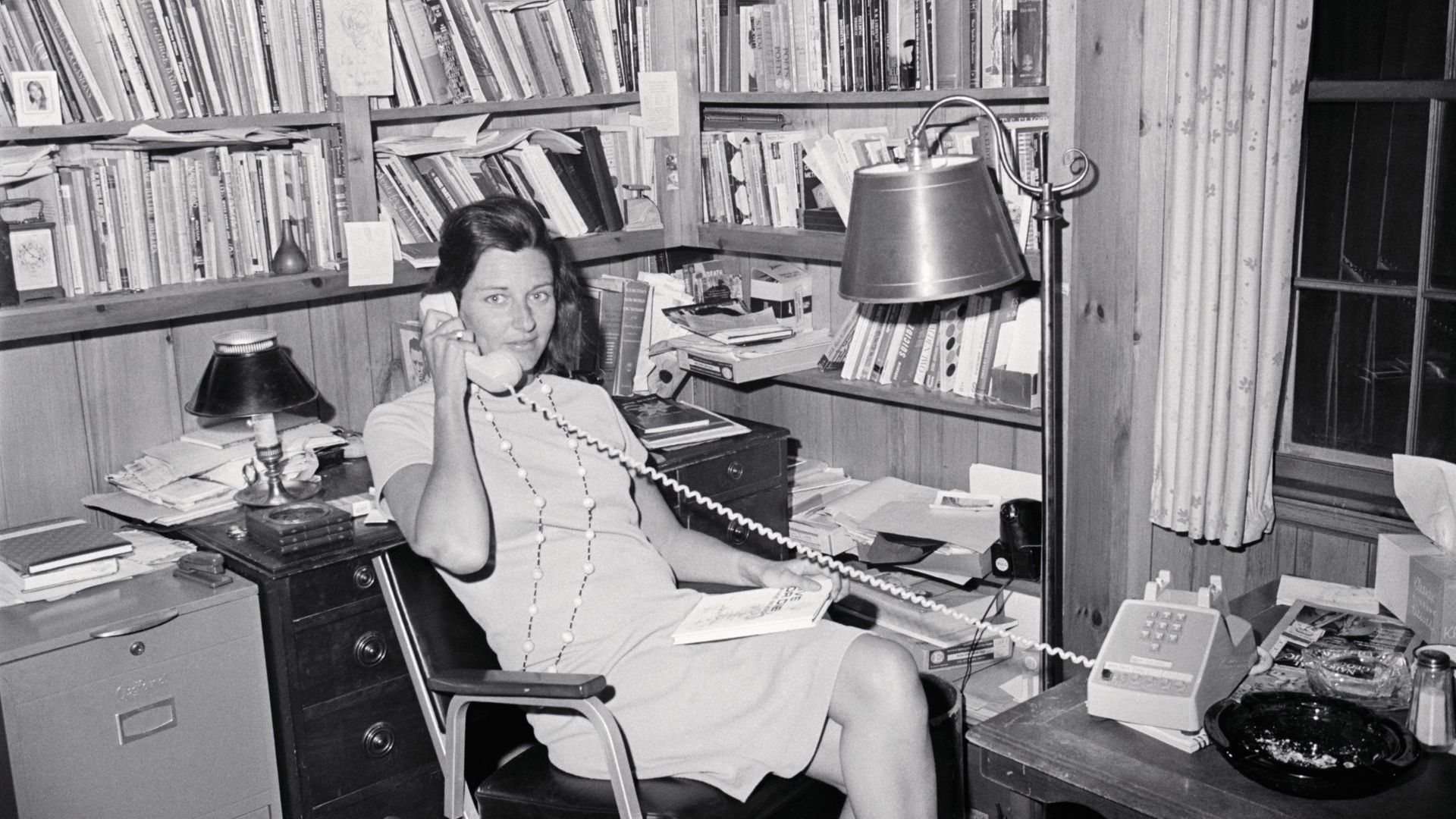 Anne Sexton talks on the phone in her office after winning the Pulitzer Prize for her book of poetry: Live or Die, 1967. - Credit: Bettmann Archive