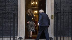 Prime Minister Boris Johnson and Carrie Symonds walking back into No.10 Downing Street. Photo: PA