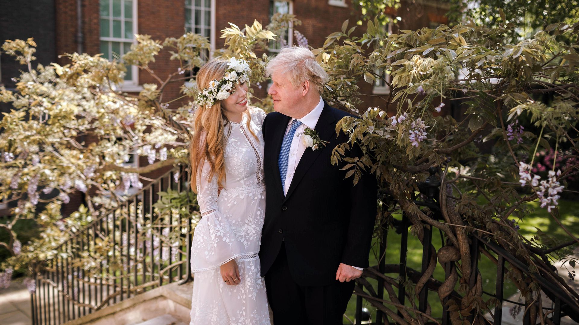 Prime Minister Boris Johnson and Carrie Johnson in the garden of 10 Downing Street after their wedding - Credit: PA