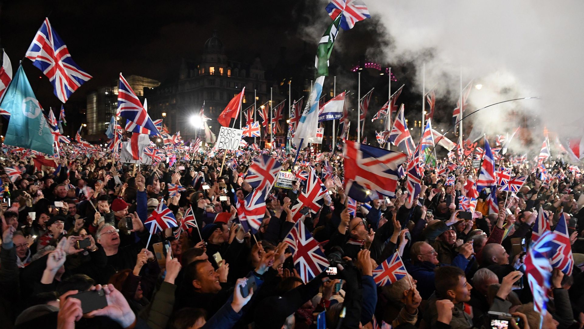 Brexit supporters wave Union flags at a rally in Parliament Square, marking the moment Britain formally left the EU on January 31, 2020 - Credit: AFP via Getty Images