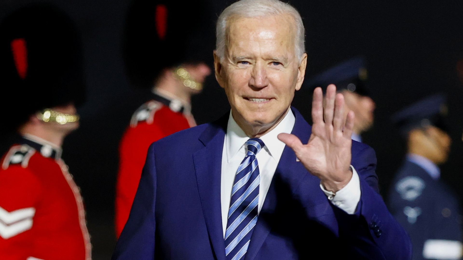 US President Joe Biden waves on arrival on Air Force One at Cornwall Airport Newquay ahead of the G7 summit - Credit: PA