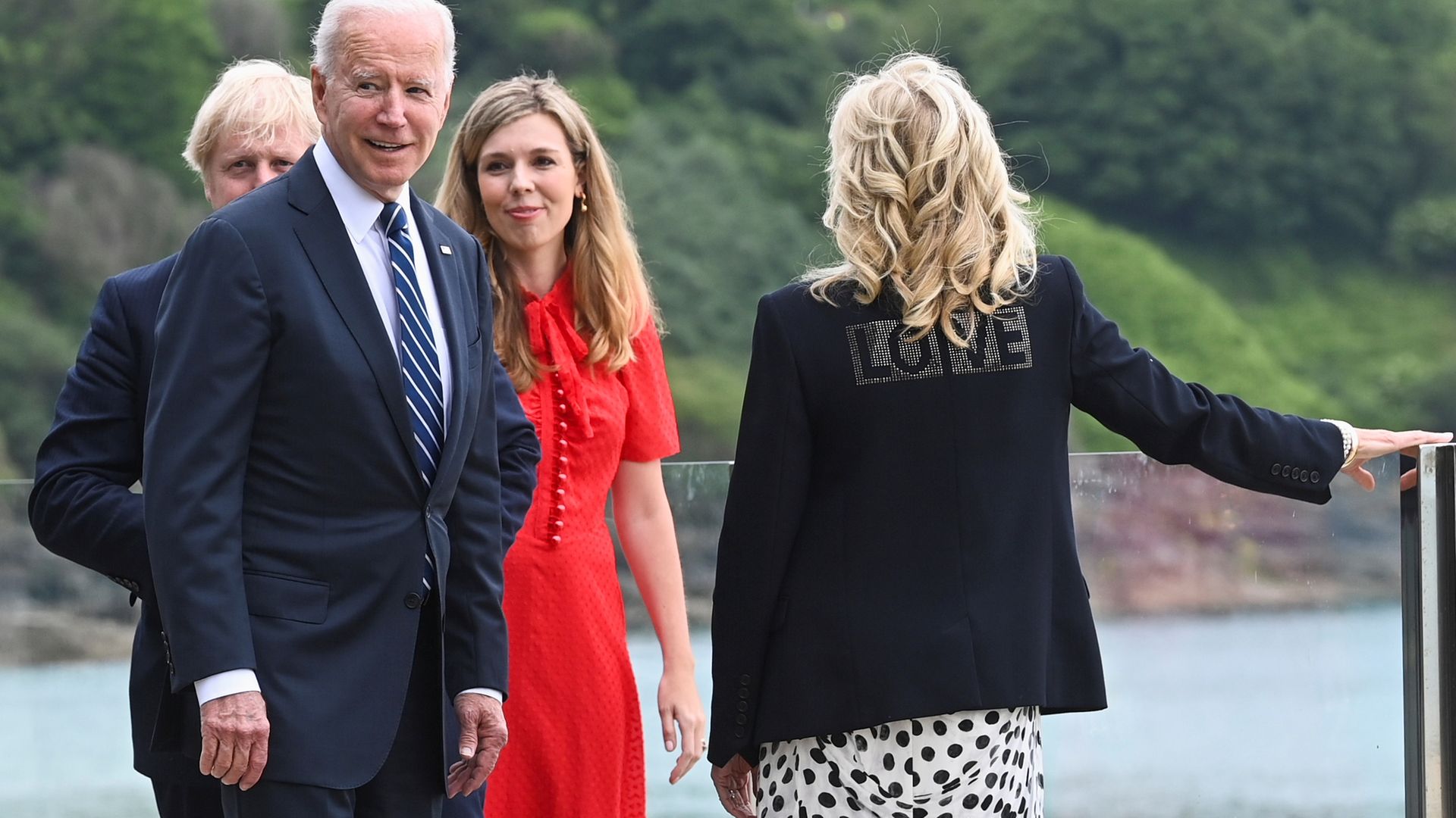 (Left to right) Prime Minister Boris Johnson, US President Joe Biden, Carrie Johnson and First Lady Jill Biden, wearing a jacket with LOVE on the back - Credit: PA
